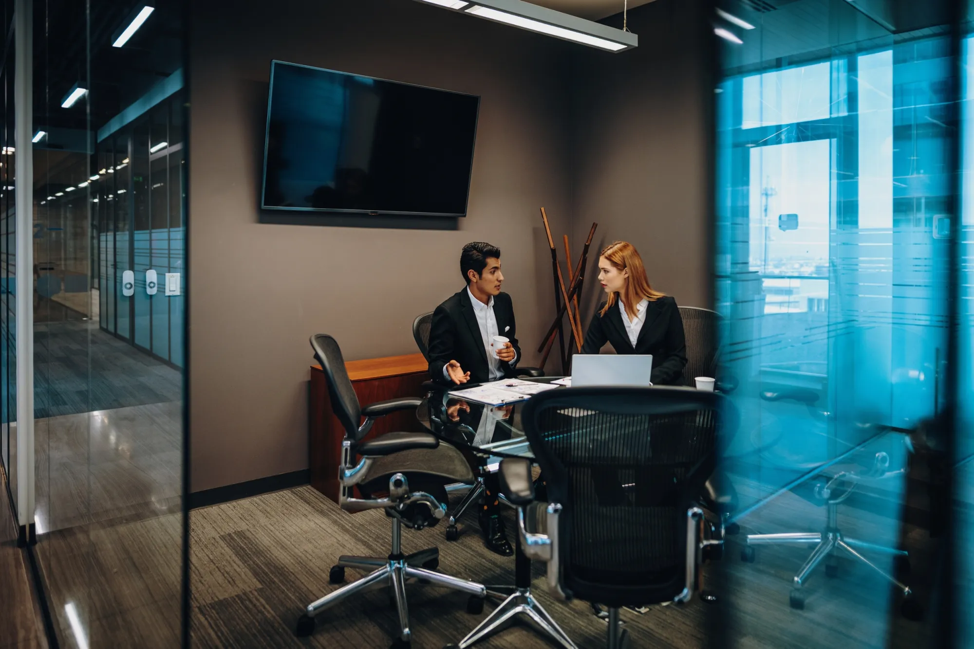 Advisers reviewing a portfolio together