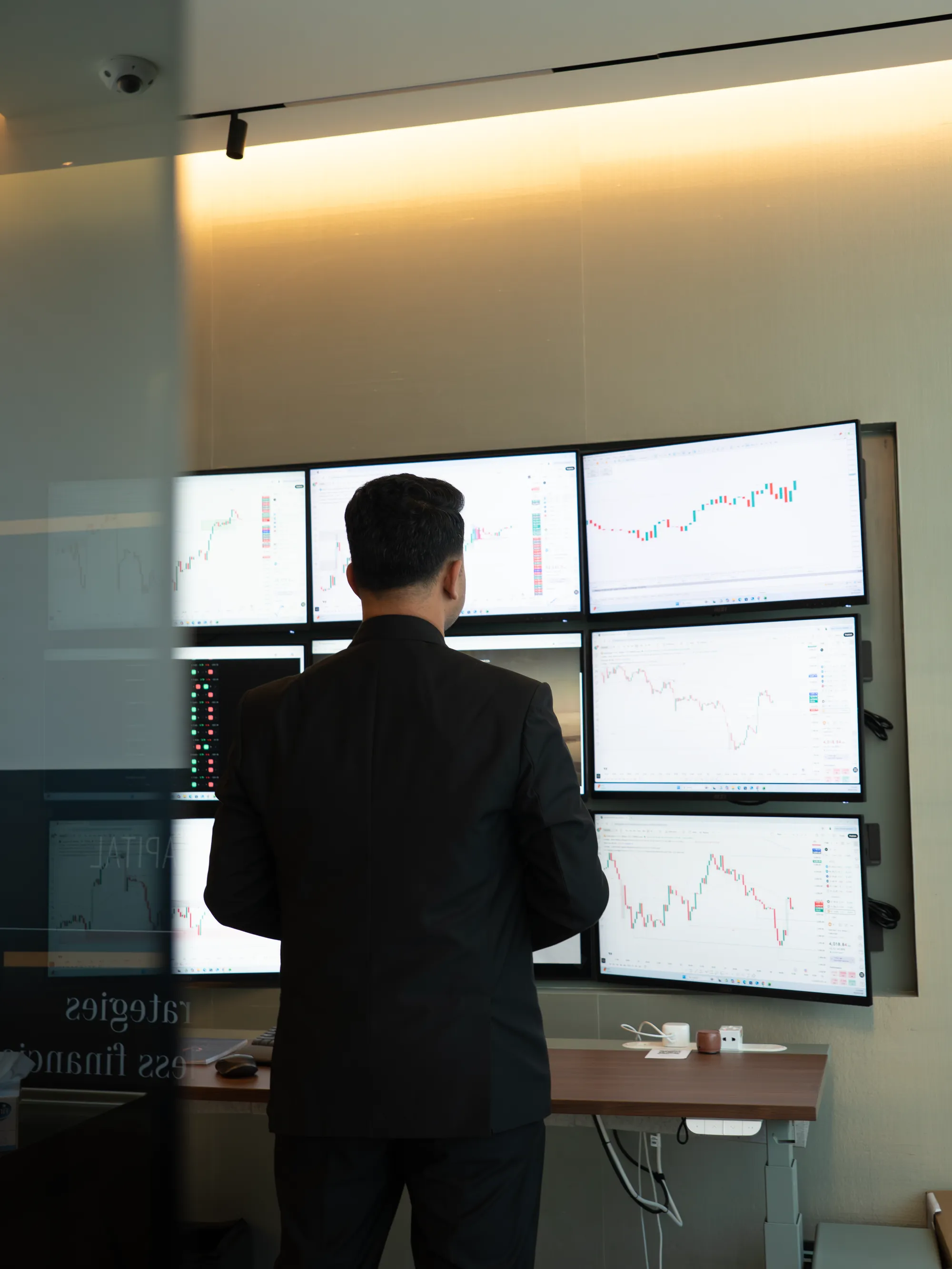 Analyst reviewing market charts